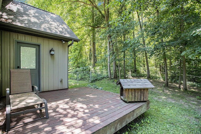 11463 Snowshoe Dr, Plainwell, MI 49080 - wooden terrace featuring a fenced backyard and a wooded view