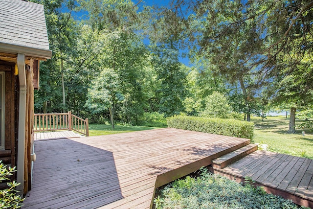 11463 Snowshoe Dr, Plainwell, MI 49080 - wooden deck featuring a yard and view of scattered trees