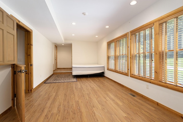 11463 Snowshoe Dr, Plainwell, MI 49080 - unfurnished bedroom with light wood finished floors and recessed lighting