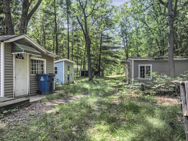 2267 Caberfae Hwy, Manistee, MI 49660 - view of yard with an outdoor structure