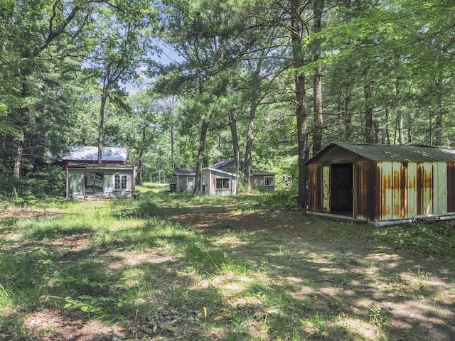 2267 Caberfae Hwy, Manistee, MI 49660 - view of yard featuring a shed