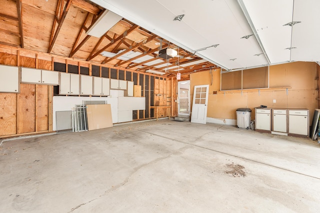 18165 Shamrock Blvd, Big Rapids, MI 49307 - garage with a garage door opener