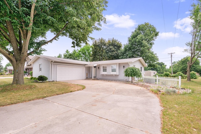 18165 Shamrock Blvd, Big Rapids, MI 49307 - single story home with a garage and concrete driveway