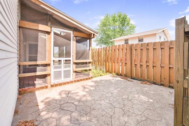 18165 Shamrock Blvd, Big Rapids, MI 49307 - view of patio with a sunroom