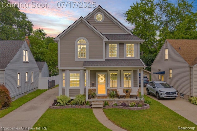 1305 Wyandotte Ave, Royal Oak, MI 48067 - view of front facade featuring concrete driveway, a shingled roof, and a porch