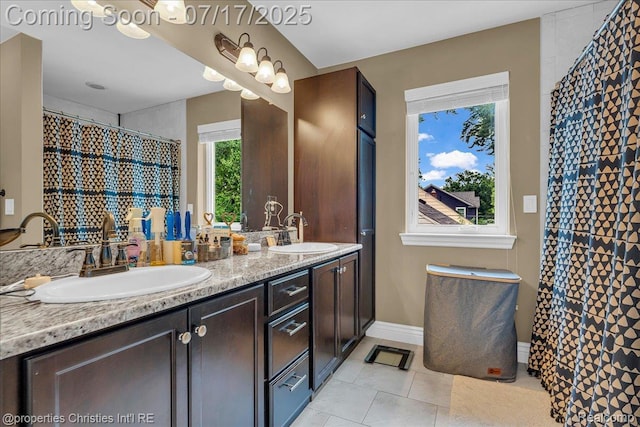 1305 Wyandotte Ave, Royal Oak, MI 48067 - bathroom featuring tile patterned flooring, double vanity, and a shower with curtain