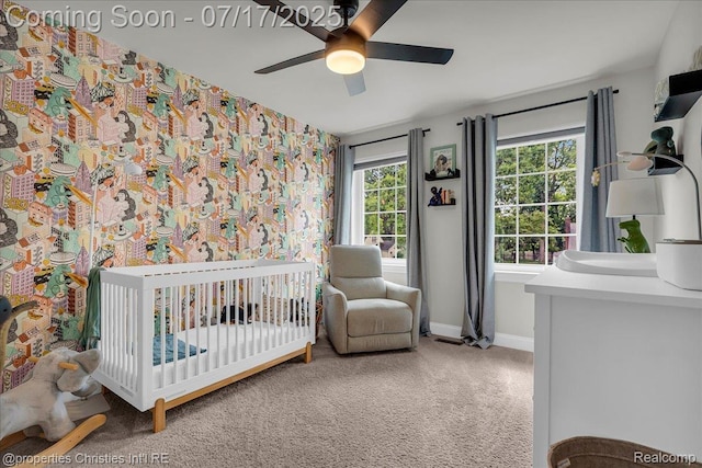 1305 Wyandotte Ave, Royal Oak, MI 48067 - carpeted bedroom with a nursery area, wallpapered walls, and a ceiling fan