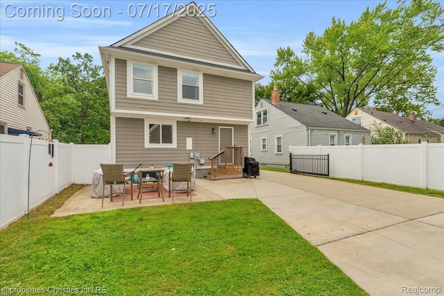 1305 Wyandotte Ave, Royal Oak, MI 48067 - rear view of house with a patio and a fenced backyard