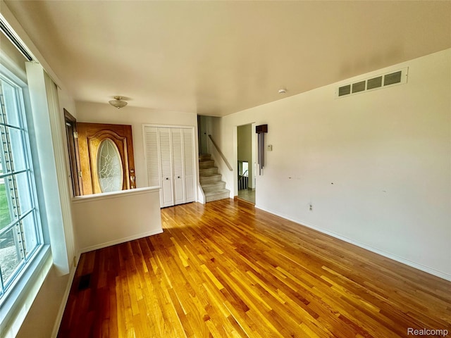 25631 Statler St, Taylor, MI 48180 - empty room with wood-type flooring and stairs