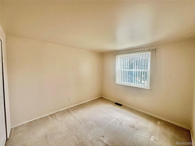 25631 Statler St, Taylor, MI 48180 - spare room featuring carpet floors and baseboards