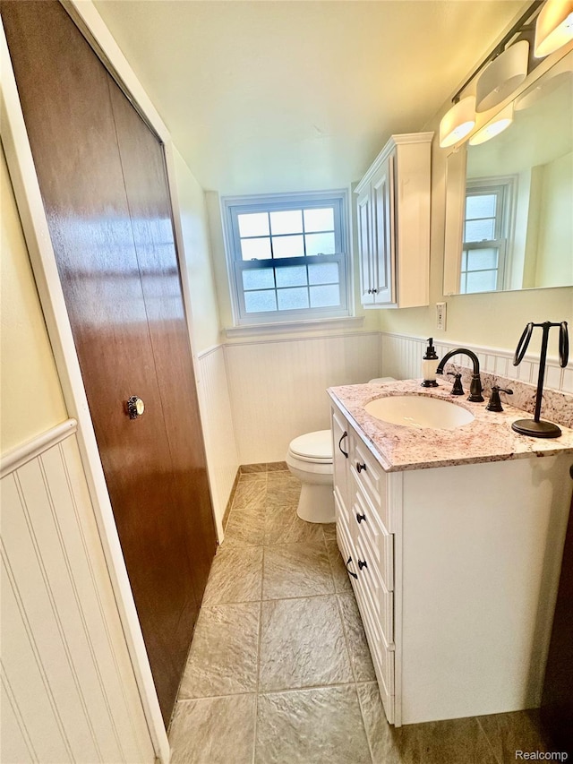 25631 Statler St, Taylor, MI 48180 - bathroom featuring vanity and wainscoting