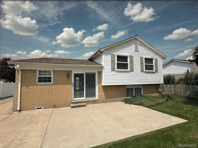 25631 Statler St, Taylor, MI 48180 - rear view of house with a patio area and brick siding