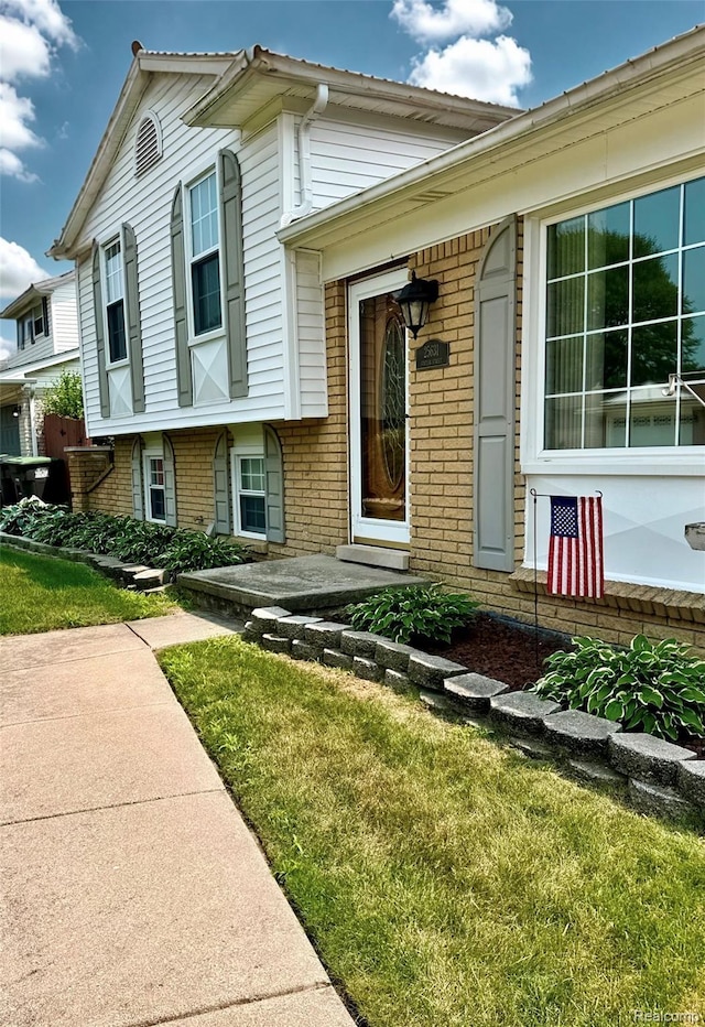 25631 Statler St, Taylor, MI 48180 - view of front of property featuring brick siding and a front lawn