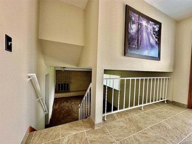 25631 Statler St, Taylor, MI 48180 - stairway with a towering ceiling and a brick fireplace