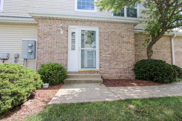 3216 E Morgan Creek Ct, Indiana, IN 46385 - doorway to property featuring brick siding