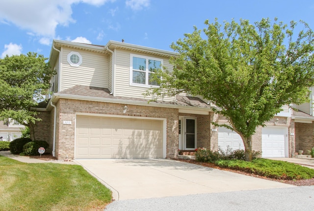 3216 E Morgan Creek Ct, Indiana, IN 46385 - traditional-style house with driveway, brick siding, and a garage