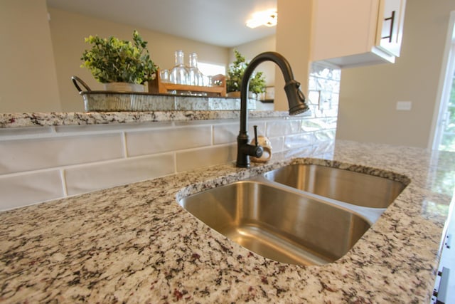 3216 E Morgan Creek Ct, Indiana, IN 46385 - kitchen view of light stone counters and white cabinets