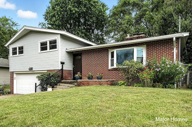 1435 Sweet St NE, Grand Rapids, MI 49505 - tri-level home with brick siding, an attached garage, a chimney, a front lawn, and driveway
