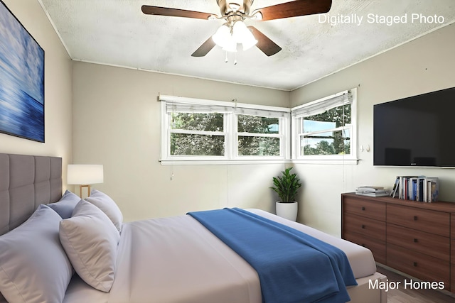 1435 Sweet St NE, Grand Rapids, MI 49505 - bedroom featuring ceiling fan and wood finished floors