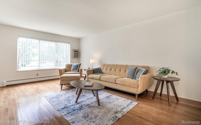 5959 Alan Dr # 56, Brighton, MI 48116 - living room featuring a baseboard heating unit, wood finished floors, a wall mounted AC, and baseboard heating
