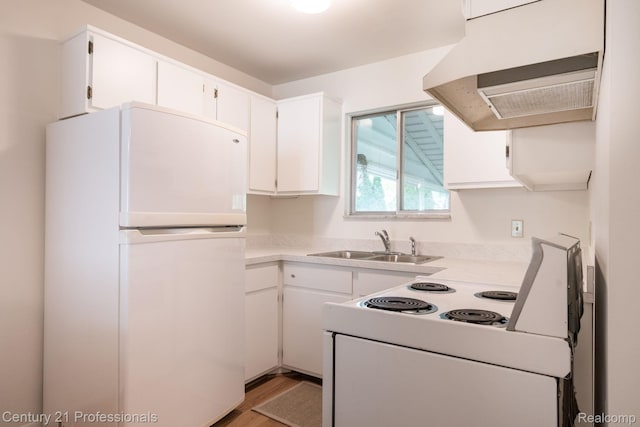 5959 Alan Dr # 56, Brighton, MI 48116 - kitchen with white appliances, extractor fan, light countertops, white cabinetry, and light wood-style floors