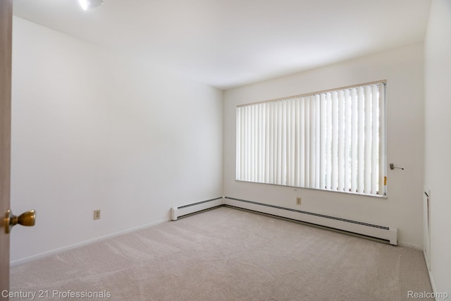 5959 Alan Dr # 56, Brighton, MI 48116 - empty room with carpet and baseboard heating