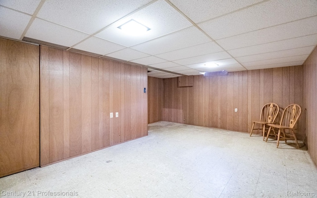 5959 Alan Dr # 56, Brighton, MI 48116 - finished basement featuring tile patterned floors, wood walls, and a drop ceiling