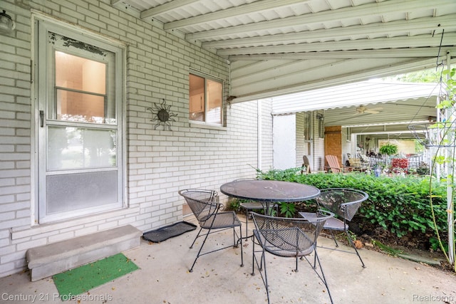 5959 Alan Dr # 56, Brighton, MI 48116 - view of patio with outdoor dining area