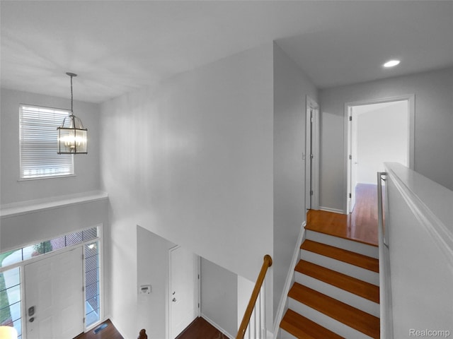 1960 Frances Way, Ypsilanti, MI 48198 - staircase with a chandelier, plenty of natural light, recessed lighting, and wood finished floors