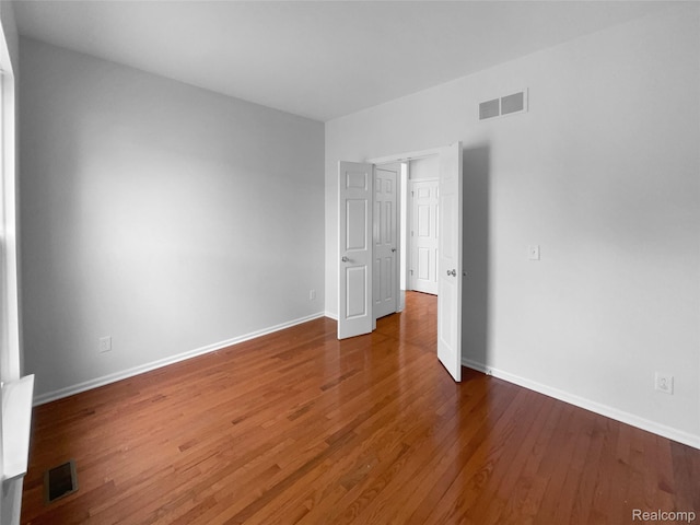 1960 Frances Way, Ypsilanti, MI 48198 - unfurnished bedroom featuring wood finished floors and baseboards