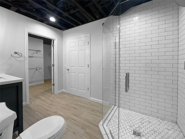 1960 Frances Way, Ypsilanti, MI 48198 - full bathroom featuring a stall shower, wood finished floors, a spacious closet, and vanity