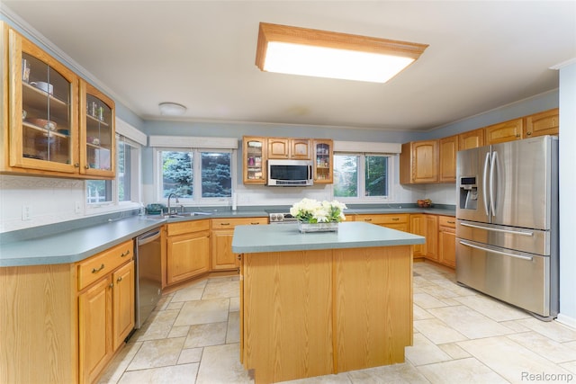 13381 Latheron Dr, Plymouth, MI 48170 - kitchen with appliances with stainless steel finishes, a center island, glass insert cabinets, and light countertops