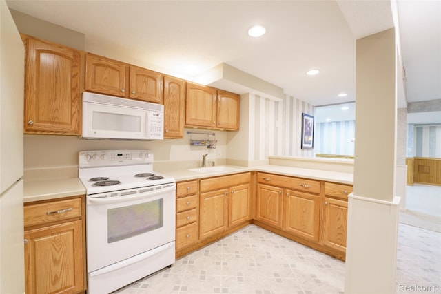 13381 Latheron Dr, Plymouth, MI 48170 - kitchen featuring white appliances, light countertops, and recessed lighting