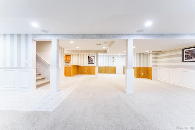 13381 Latheron Dr, Plymouth, MI 48170 - finished below grade area with wallpapered walls, a wainscoted wall, carpet flooring, recessed lighting, and stairs