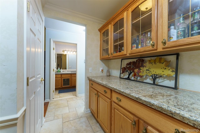 13381 Latheron Dr, Plymouth, MI 48170 - bar area featuring crown molding and light stone finish flooring