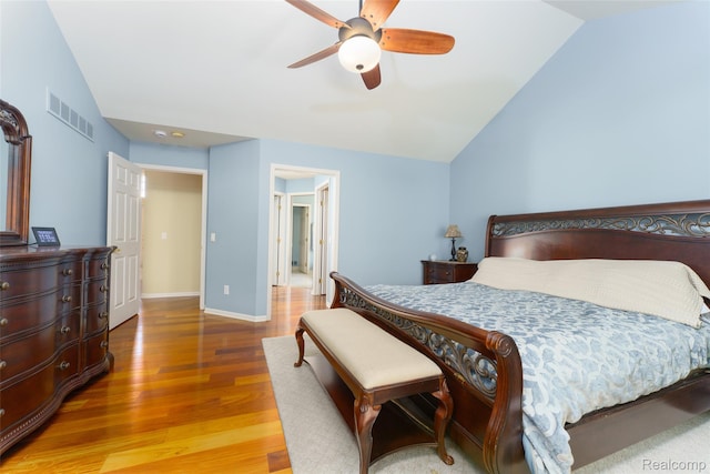 13381 Latheron Dr, Plymouth, MI 48170 - bedroom featuring lofted ceiling, wood finished floors, and a ceiling fan
