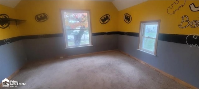 108 N Mercer St, Durand, MI 48429 - spare room featuring lofted ceiling and carpet