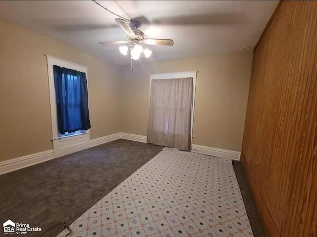 108 N Mercer St, Durand, MI 48429 - empty room featuring carpet flooring and ceiling fan