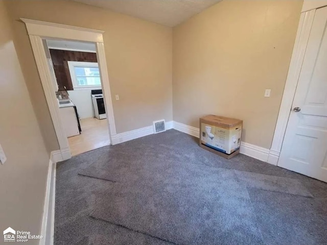 108 N Mercer St, Durand, MI 48429 - empty room with carpet and baseboards