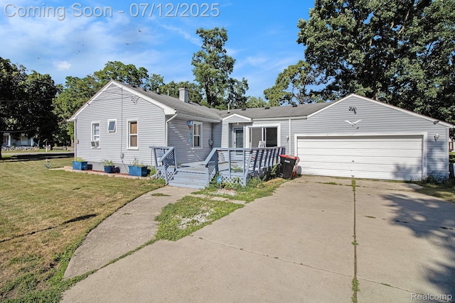 26651 Shiawassee Rd, Southfield, MI 48033 - view of front of home with a front lawn, driveway, a garage, and a chimney