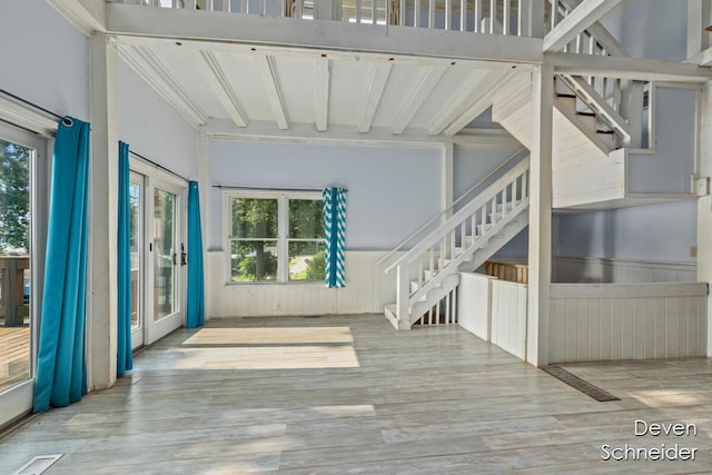 65 Sundago Park St, Hastings, MI 49058 - foyer with stairs, beamed ceiling, wainscoting, and wood finished floors