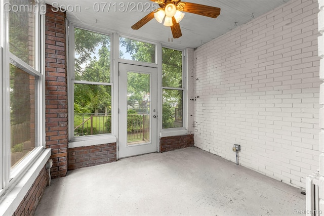 830 S Brady Rd, Dearborn, MI 48124 - unfurnished sunroom with a ceiling fan and plenty of natural light