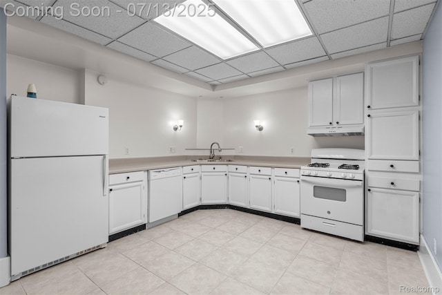 830 S Brady Rd, Dearborn, MI 48124 - kitchen featuring white appliances, under cabinet range hood, a drop ceiling, light countertops, and white cabinetry