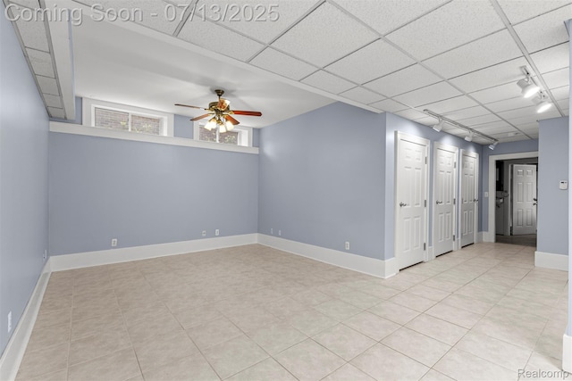 830 S Brady Rd, Dearborn, MI 48124 - spare room featuring track lighting, a ceiling fan, and light tile patterned floors