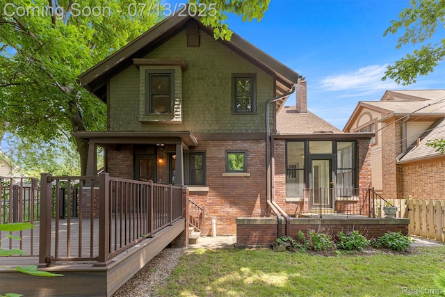 830 S Brady Rd, Dearborn, MI 48124 - back of house featuring brick siding and a sunroom