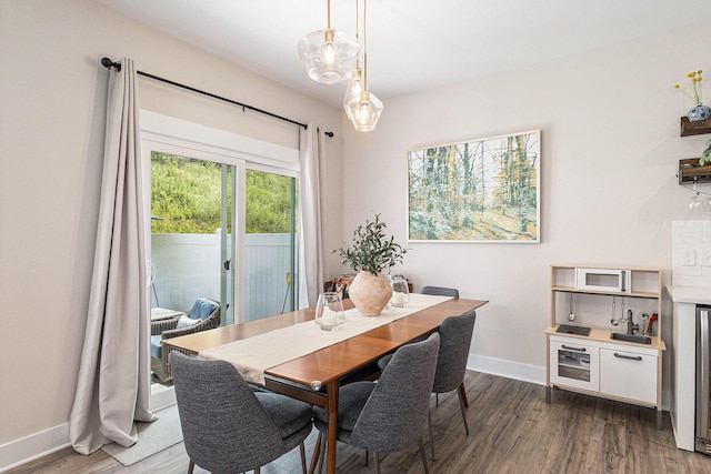 1014 Castlebay Way Unit 8, Hudsonville, MI 49426 - dining room featuring wood finished floors