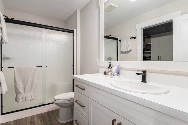1014 Castlebay Way Unit 8, Hudsonville, MI 49426 - full bath with vanity, a stall shower, and wood finished floors