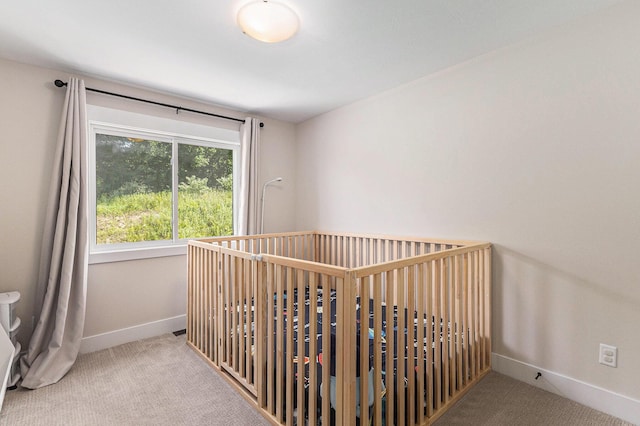 1014 Castlebay Way Unit 8, Hudsonville, MI 49426 - unfurnished bedroom featuring carpet and a crib