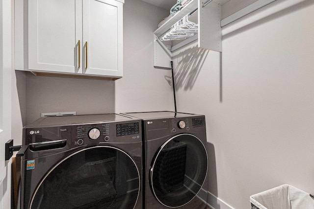 1014 Castlebay Way Unit 8, Hudsonville, MI 49426 - laundry area featuring cabinet space and separate washer and dryer