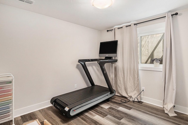 1014 Castlebay Way Unit 8, Hudsonville, MI 49426 - exercise room featuring baseboards and wood finished floors
